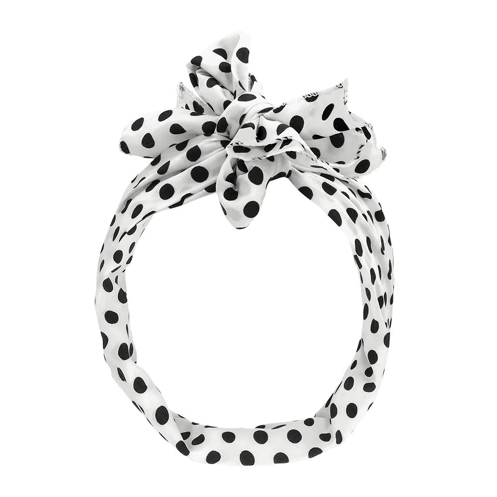 A set of golden accessories (glasses, bow tie and bracelets) in different colors