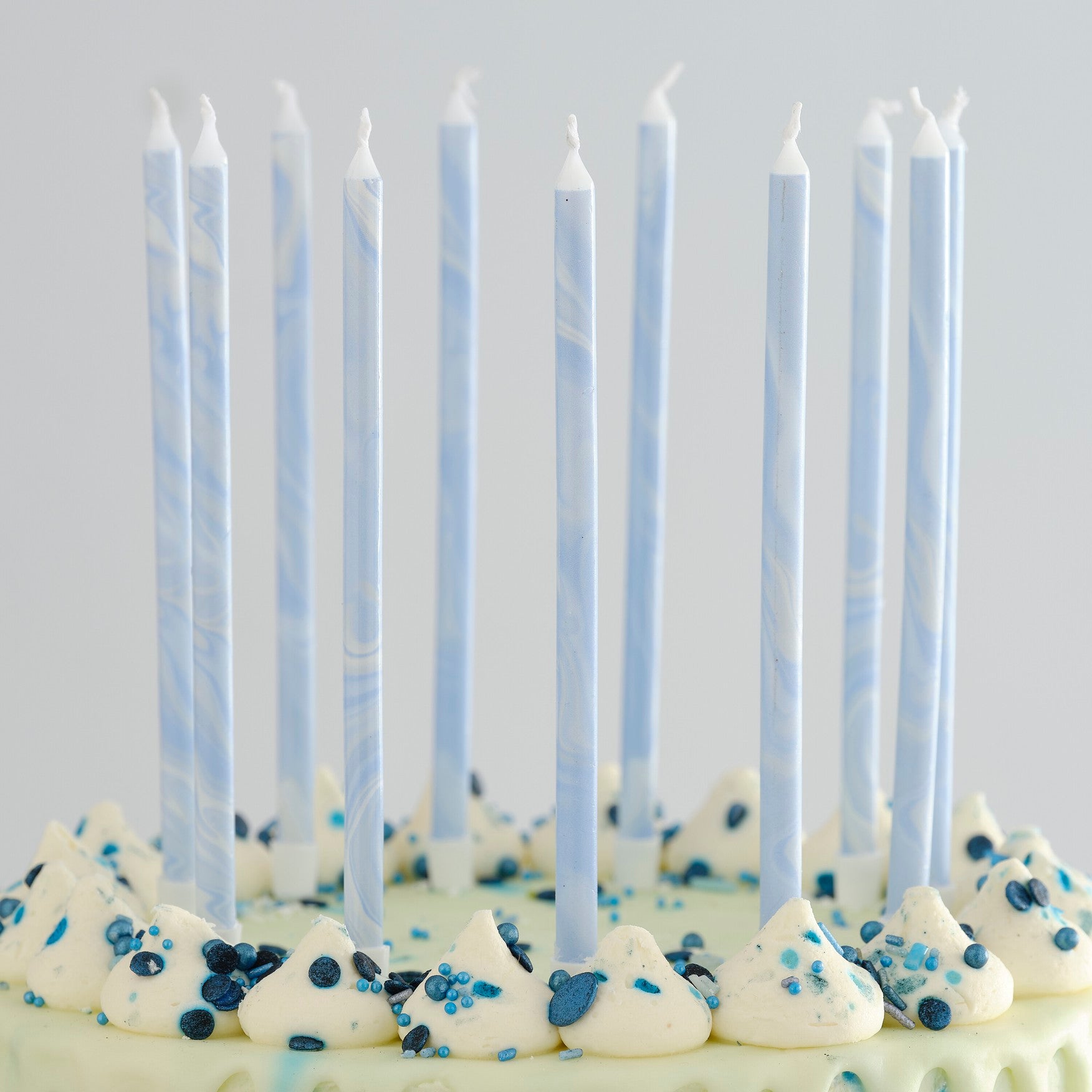 Blue candle with marble effect 12 cm 18 cm