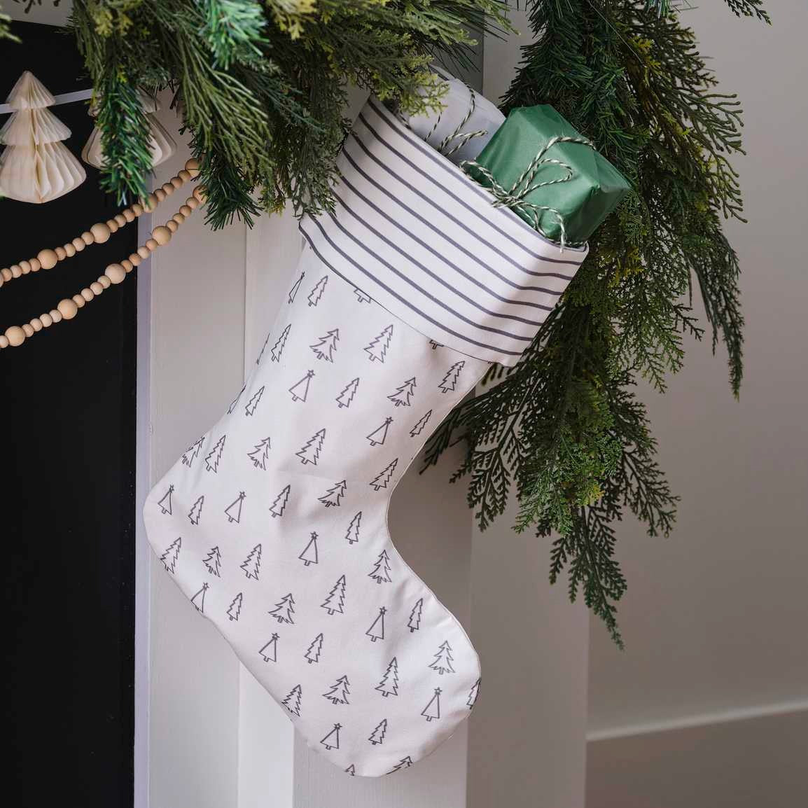 Christmas white stocking with various Christmas tree prints 45cm x 32cm