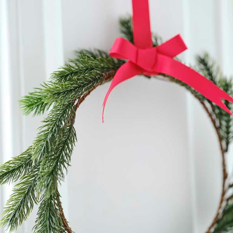 Hanging Christmas decoration with red ribbons