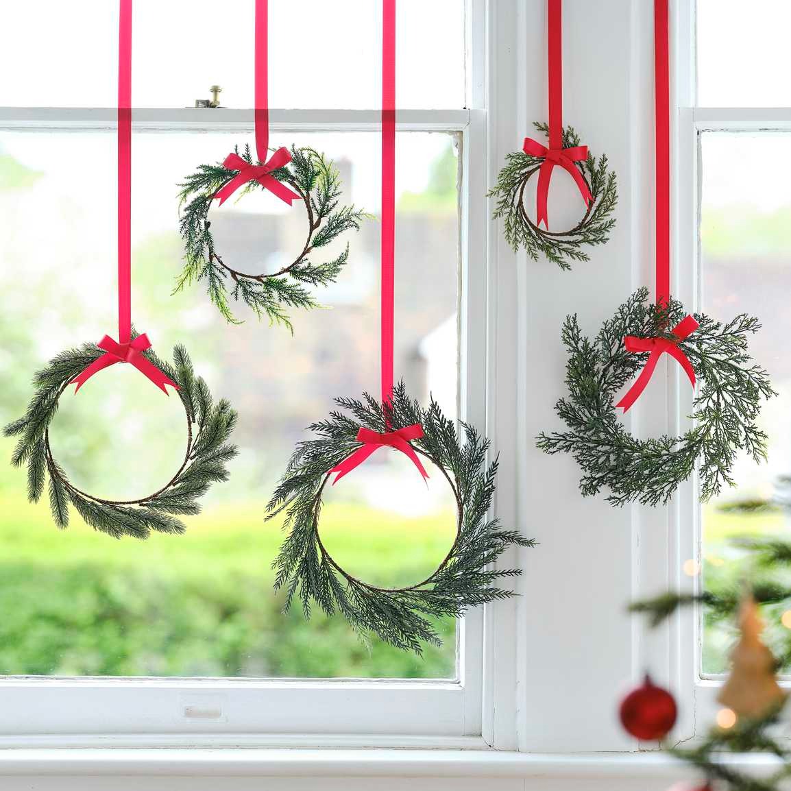 Hanging Christmas decoration with red ribbons