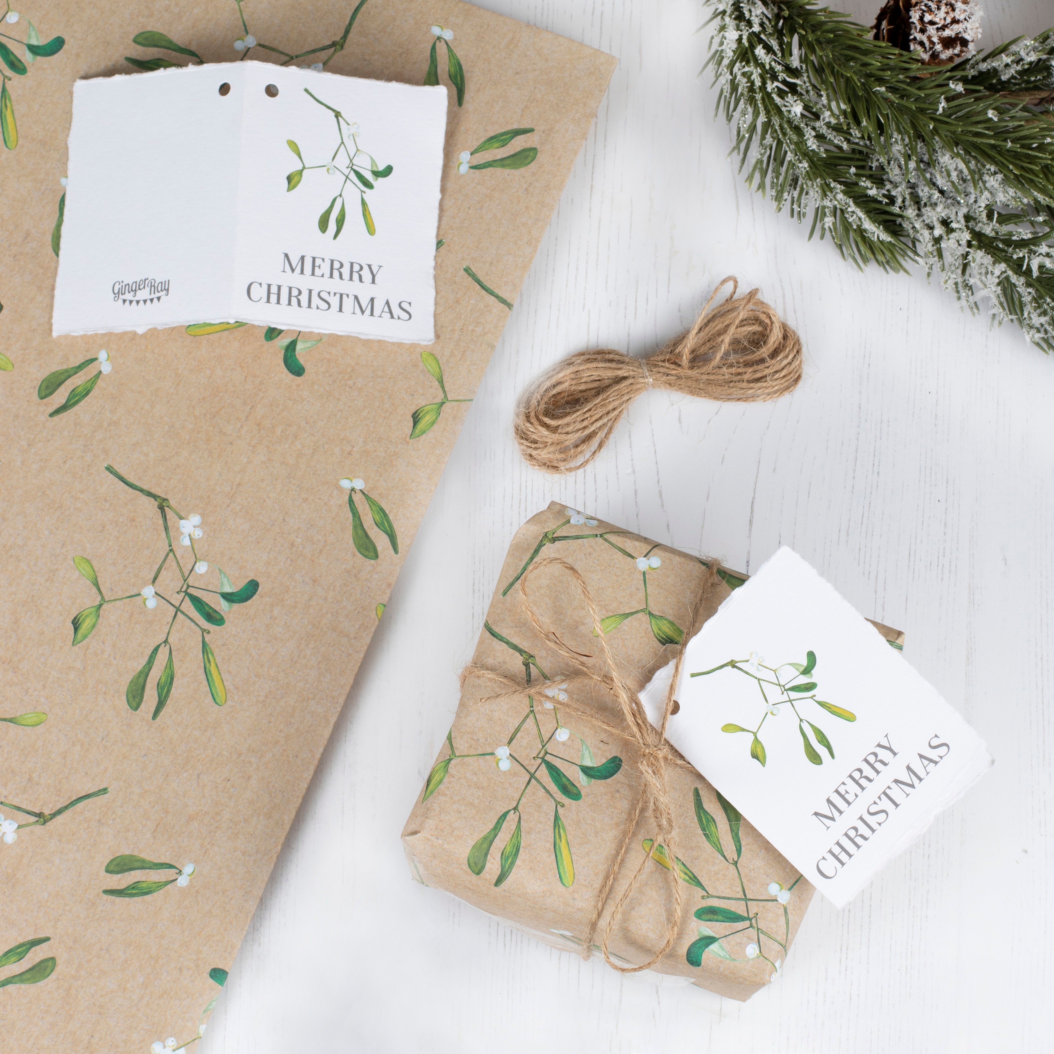 Wrapping paper with thread and greeting card