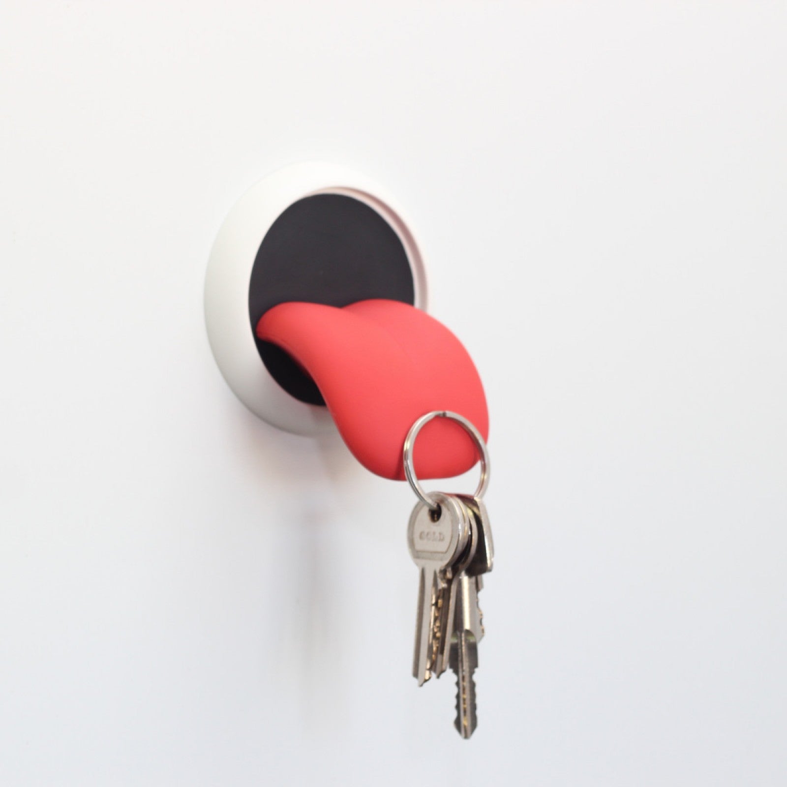 Tongue-shaped key holder